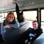 On the bus ride to UW-Whitewater, Communications seniors Meagan Ginnaty-Moore, Ramisa Ahmed and Ashley Brown relax before a day full of journalism sessions at the KEMPA conference.